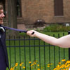 bride pulling grooms tie from chest